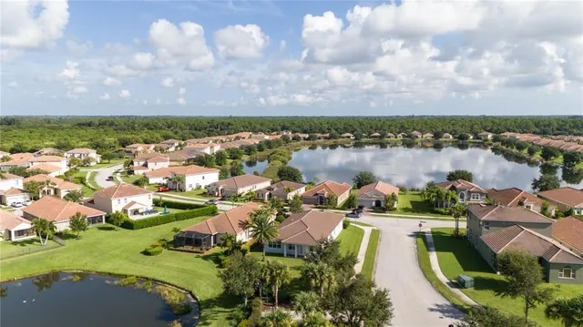 an aerial view of a house with a garden