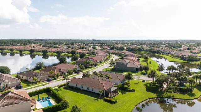 an aerial view of a house with a garden