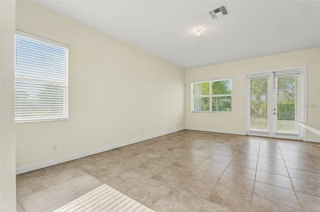 an empty room with windows