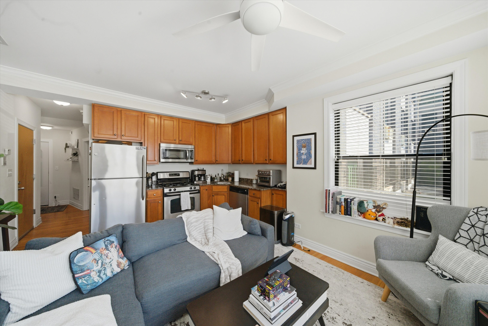 548 West Deming Place, Unit 1 Chicago, IL 60614 - Photo 4 of 11 a living room with furniture and a large window