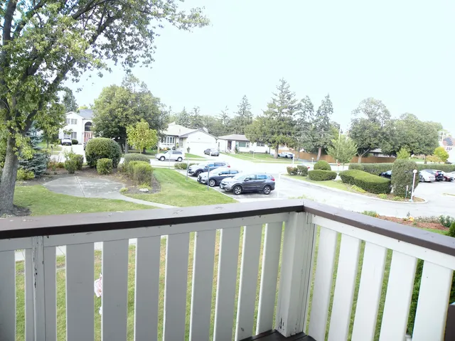 a utility room with cabinets washer and dryer