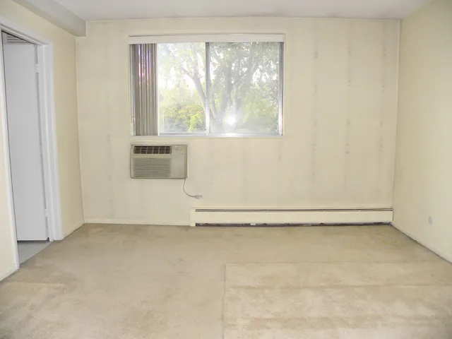 a view of a small space with a large window