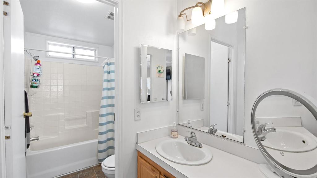 1455 Alturas Road, Unit 55 Fallbrook, CA 92028 - Photo 20 of 31 a bathroom with a sink a toilet and shower