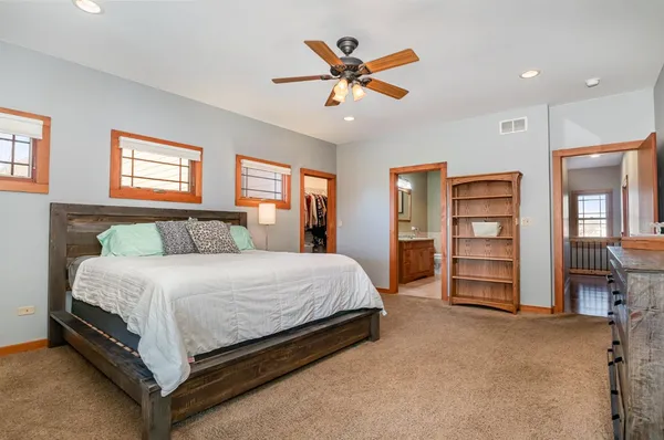 a bed room with a bed and furniture