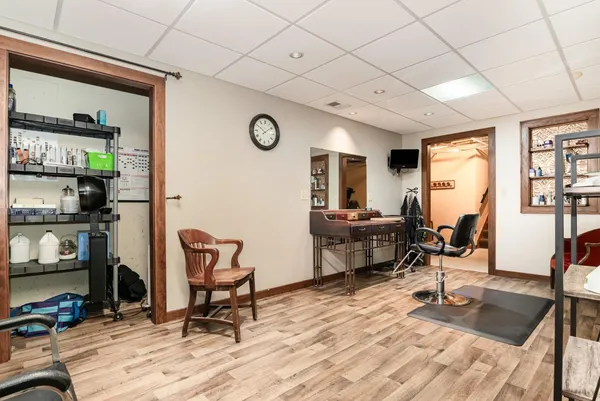 a view of a livingroom with furniture and a table