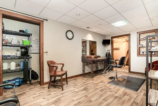 a view of a livingroom with furniture and a table