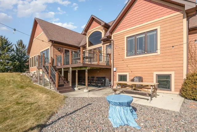a front view of a house with a patio