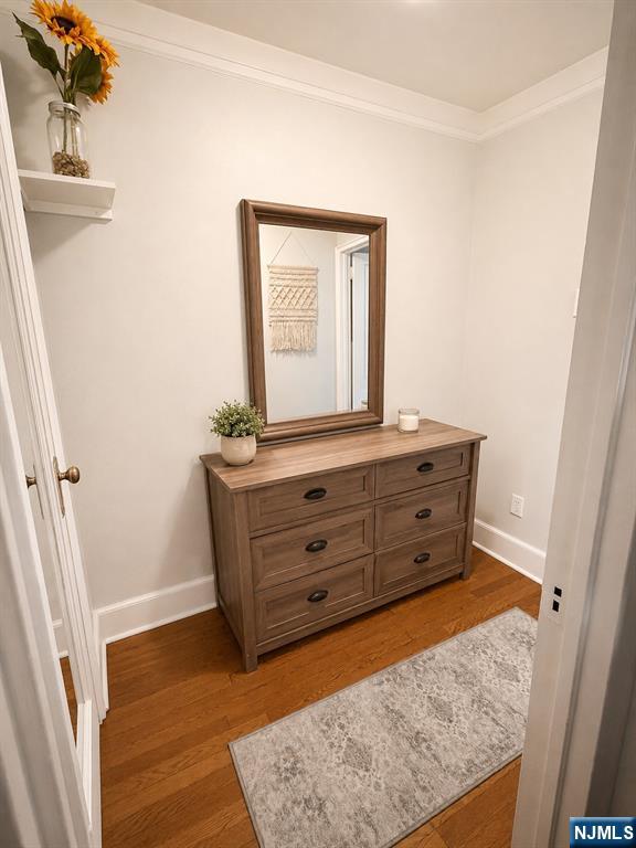 100 Prospect Avenue, Unit 5H Hackensack, NJ 07601 - Photo 15 of 17 a room with closet and mirror