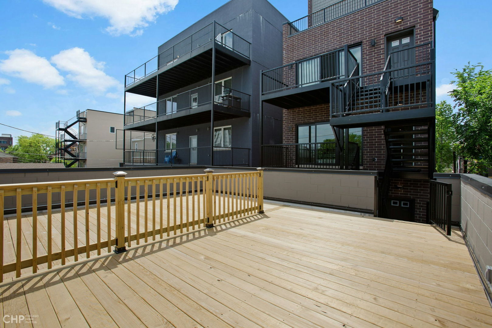 211 South Hamilton Avenue, Unit 2 Chicago, IL 60612 - Photo 15 of 16 a view of a house with a balcony