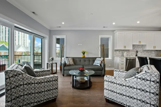 a living room with furniture and a couch
