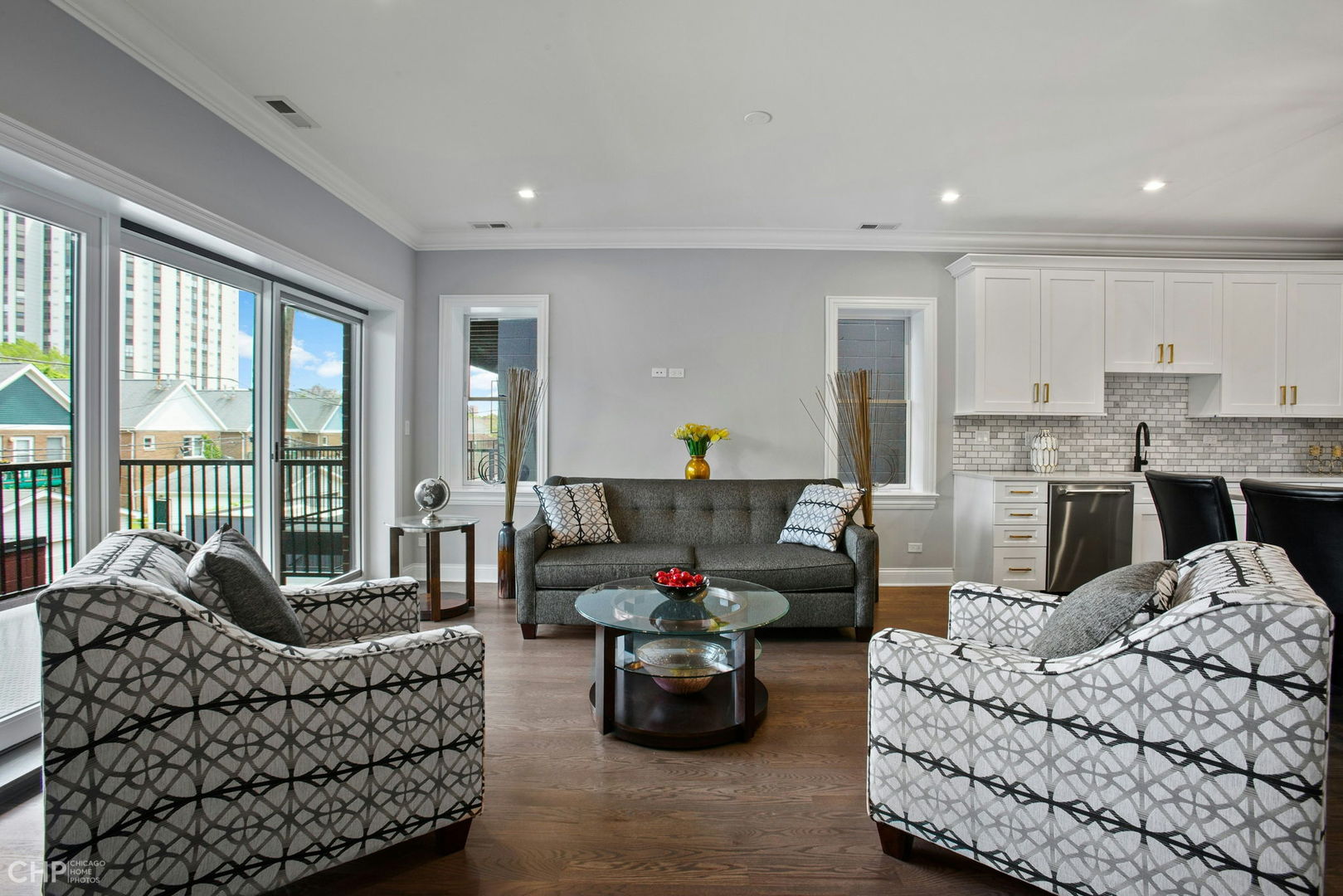 211 South Hamilton Avenue, Unit 2 Chicago, IL 60612 - Photo 7 of 16 a living room with furniture and a couch