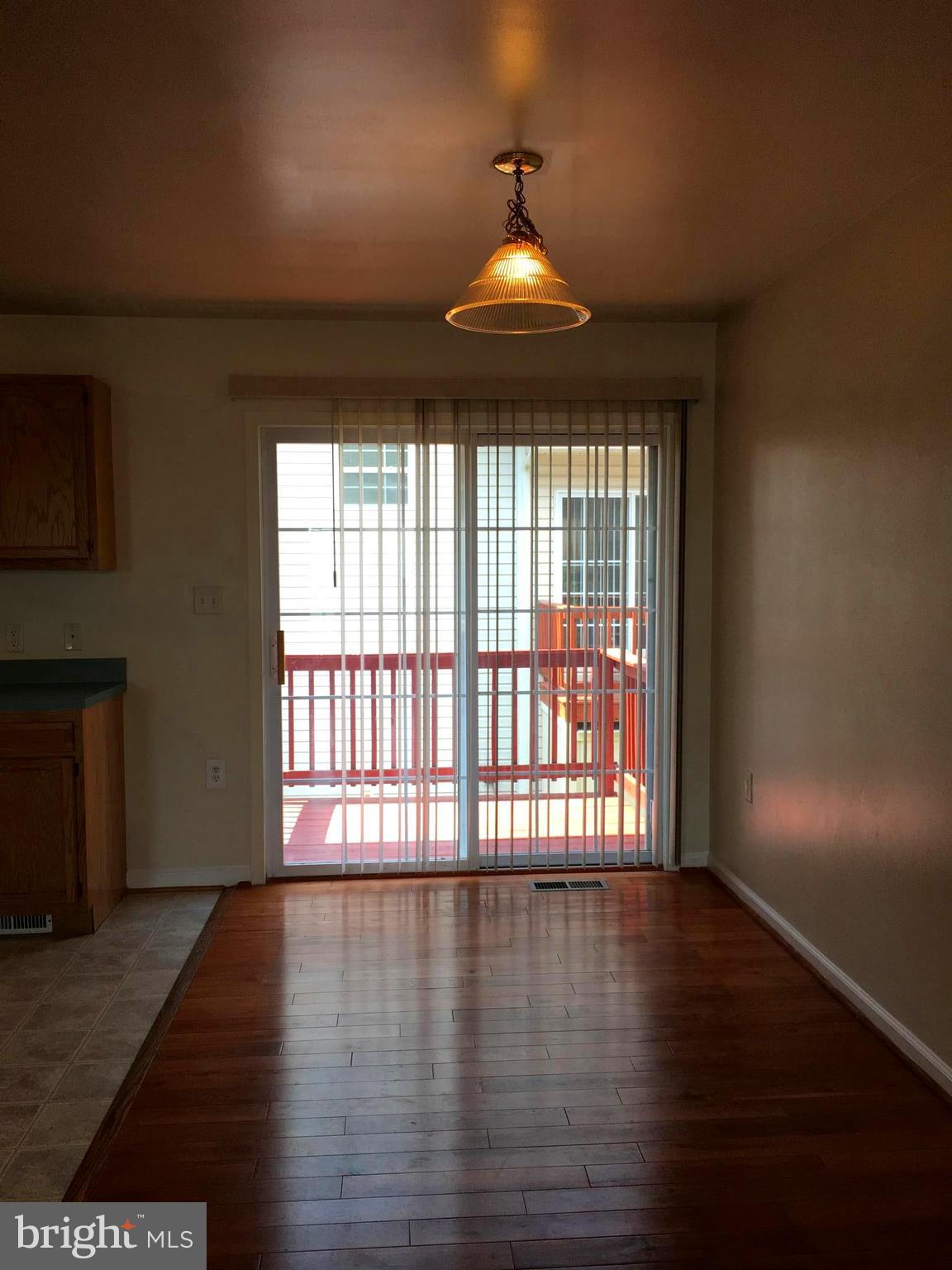 121 North Marshall Street Ranson, WV 25438 - Photo 11 of 16 Dining Rm Area offers Hardwood Flrs views to deck