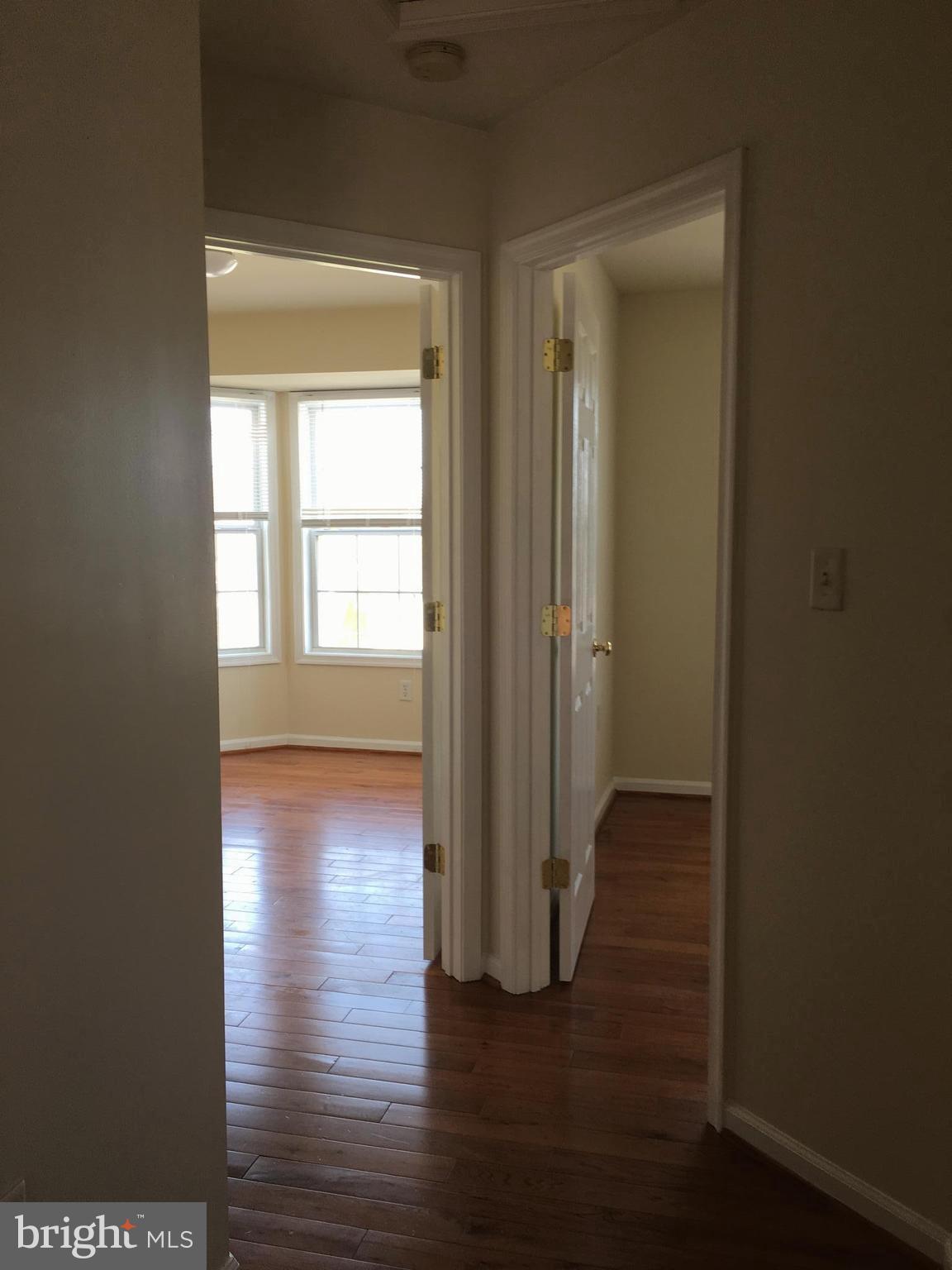 121 North Marshall Street Ranson, WV 25438 - Photo 13 of 16 View of upper level leading to bedrooms hrdwd flrs