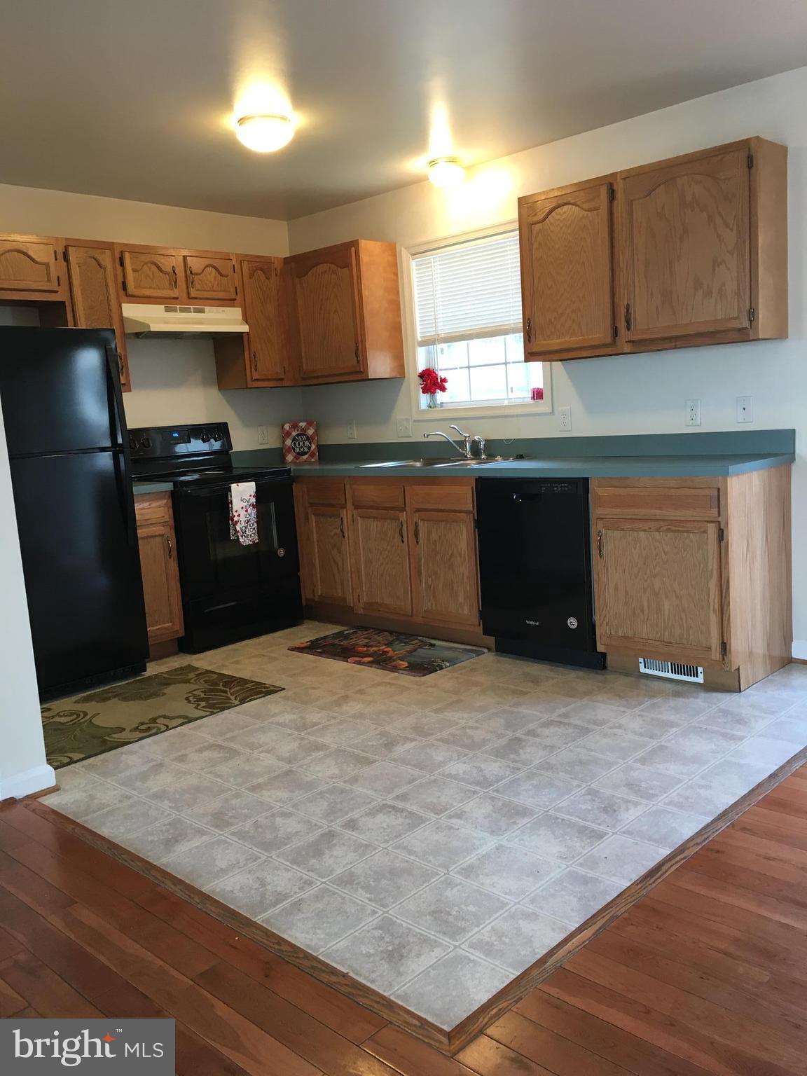 121 North Marshall Street Ranson, WV 25438 - Photo 7 of 16 Kitchen new stove, refrig, dishwasher just move in