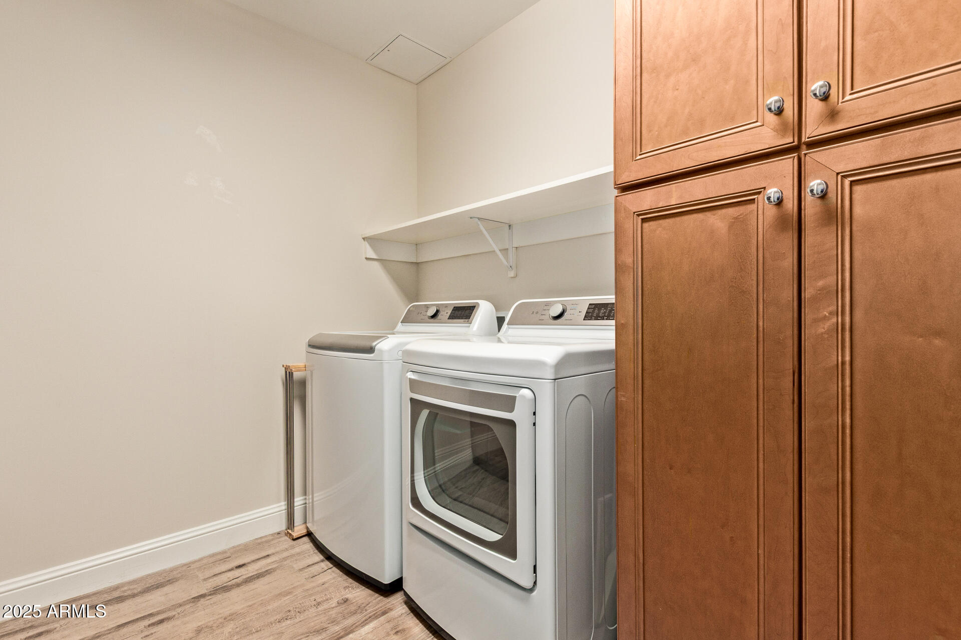 3801 North Goldwater Boulevard, Unit 302 Scottsdale, AZ 85251 - Photo 14 of 23 a utility room with dryer and washer