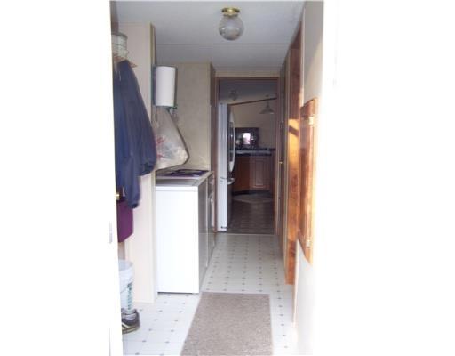 461 Canaan Road Pittsfield, ME 04967 - Photo 5 of 20 Exterior Front. Entryway from side...