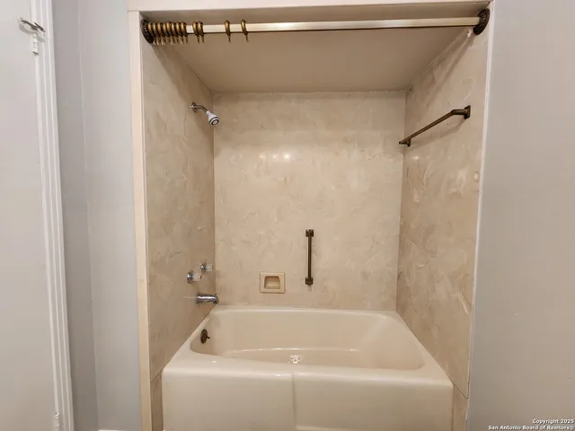 a bathroom with a bathtub