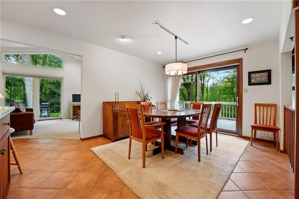 314 Winters Road Butler, PA 16002 - Photo 14 of 50 a dining room with furniture a chandelier and wooden floor
