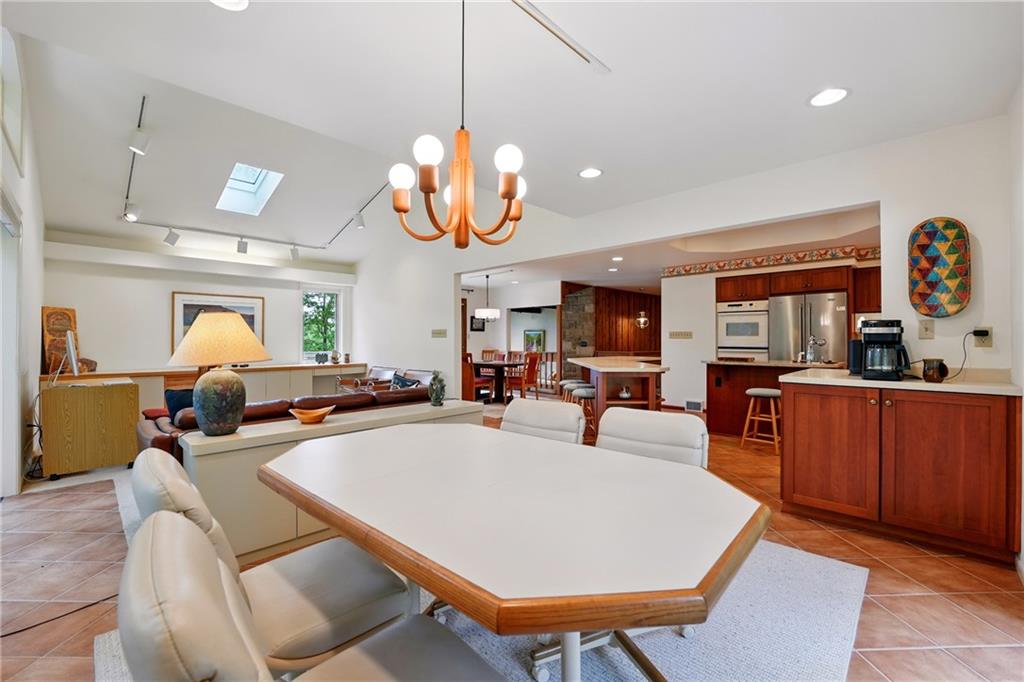 314 Winters Road Butler, PA 16002 - Photo 17 of 50 a living room with dining table a couch and kitchen view