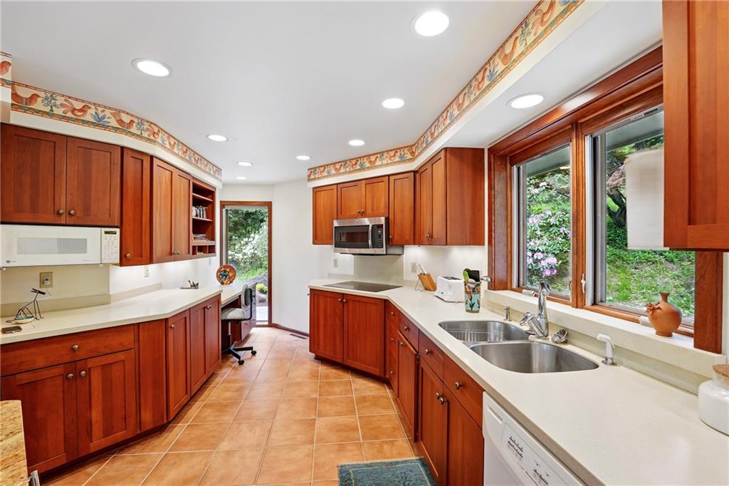 314 Winters Road Butler, PA 16002 - Photo 22 of 50 a large kitchen with stainless steel appliances granite countertop sink stove and cabinets