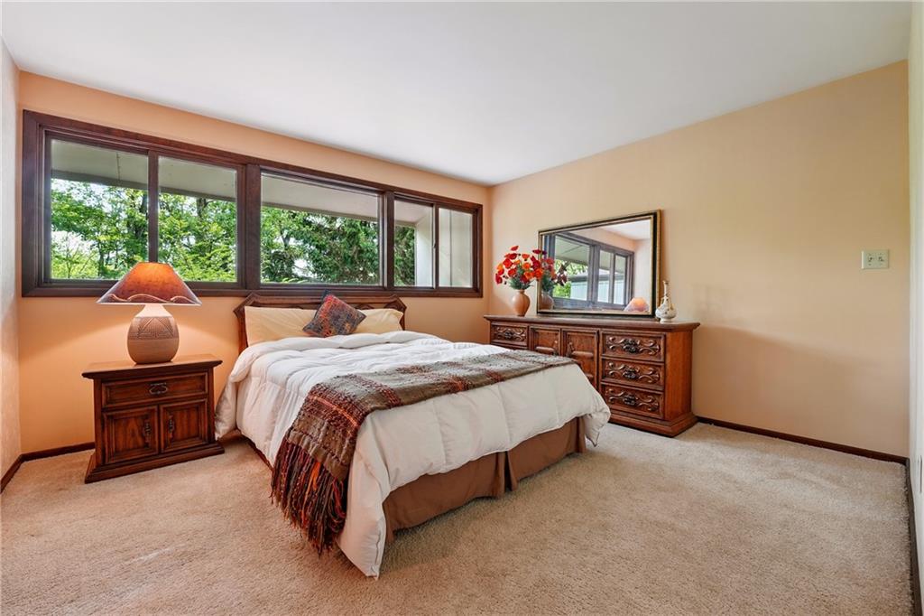 314 Winters Road Butler, PA 16002 - Photo 37 of 50 a bed sitting in a bedroom next to a large window