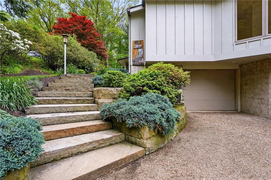 314 Winters Road Butler, PA 16002 - Photo 4 of 50 a view of a backyard with potted plants