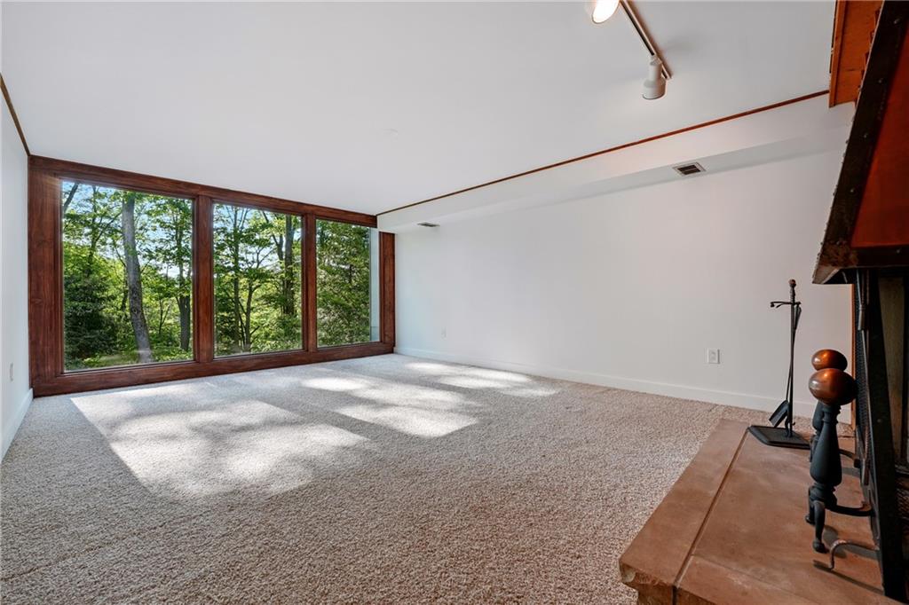 314 Winters Road Butler, PA 16002 - Photo 42 of 50 a view of a room with gym equipment and a large window