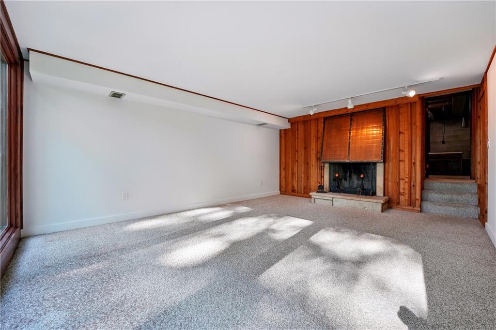314 Winters Road Butler, PA 16002 - Photo 43 of 50 a view of empty room with fireplace and window