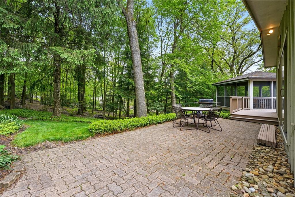 314 Winters Road Butler, PA 16002 - Photo 10 of 50 a view of backyard with a table and chairs