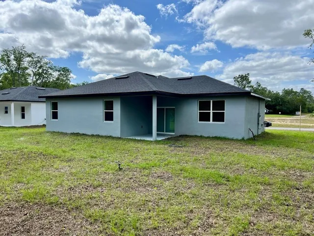 a house view with a garden space