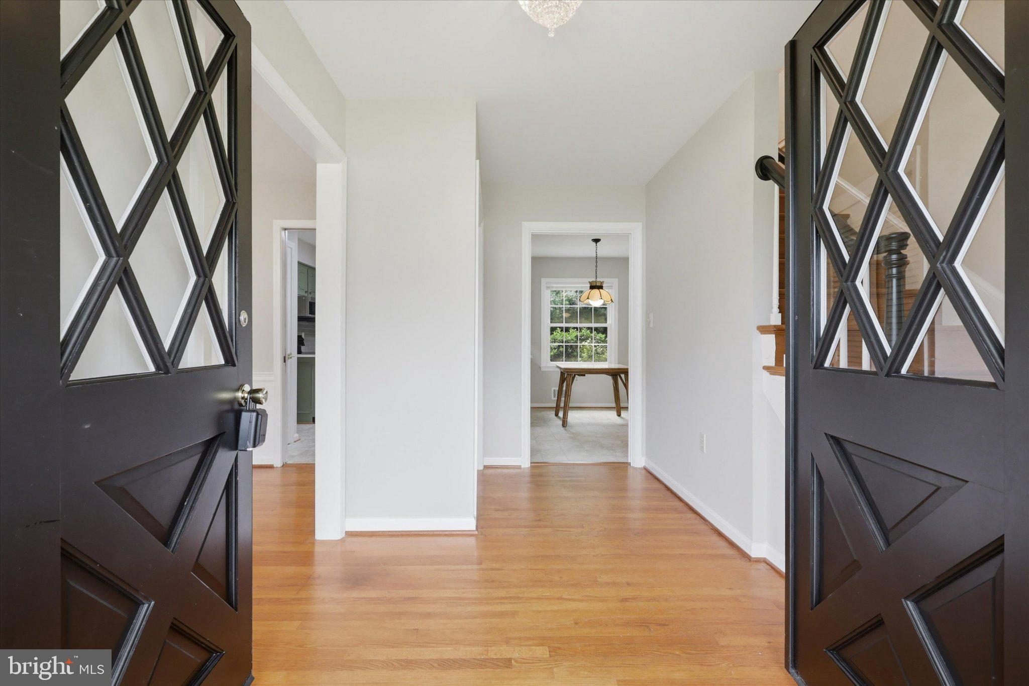 7007 Runnymeade Court Frederick, MD 21702 - Photo 5 of 37 Inviting entryway with elegant doors.