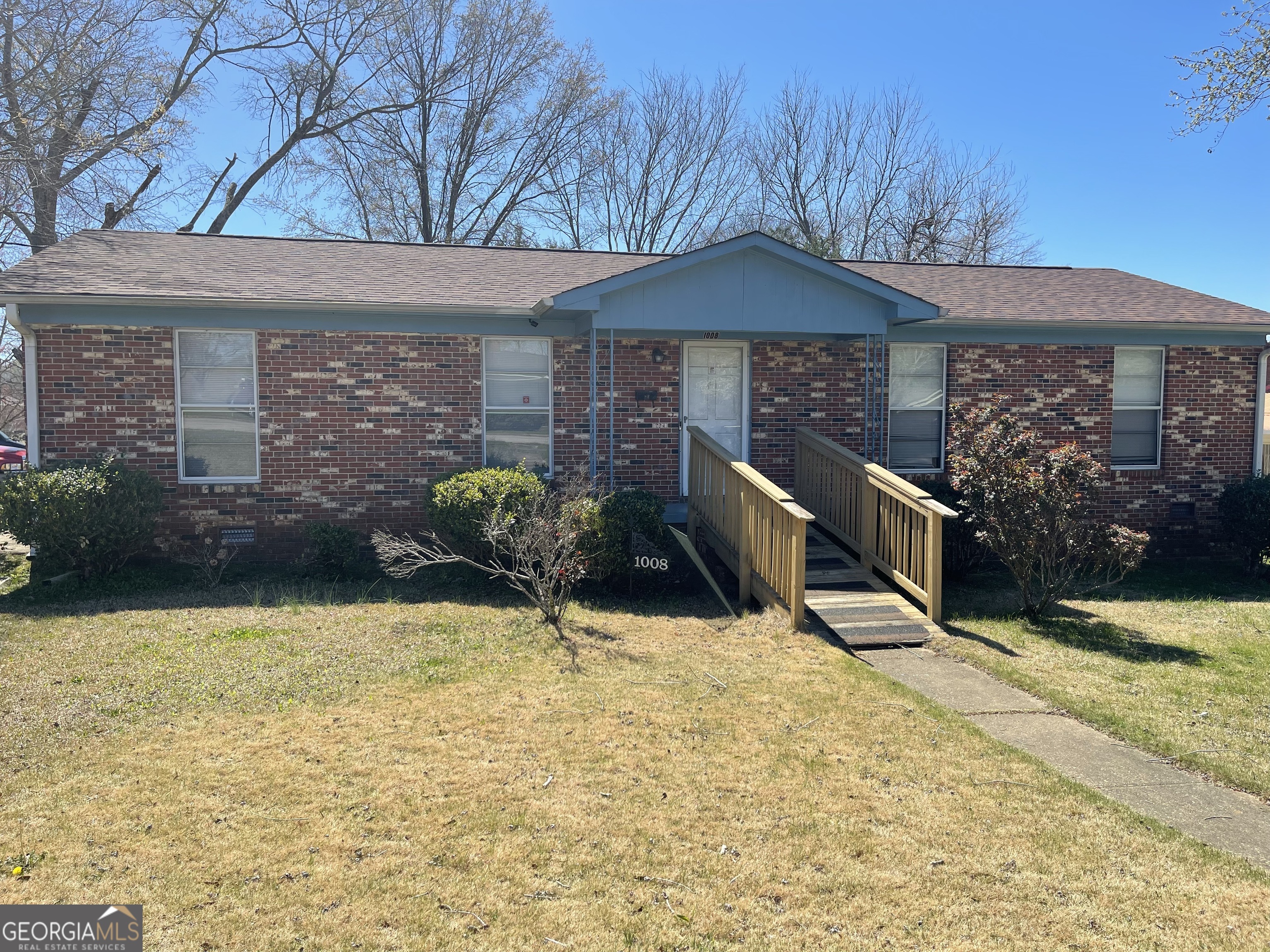 a backyard of a house with seating space