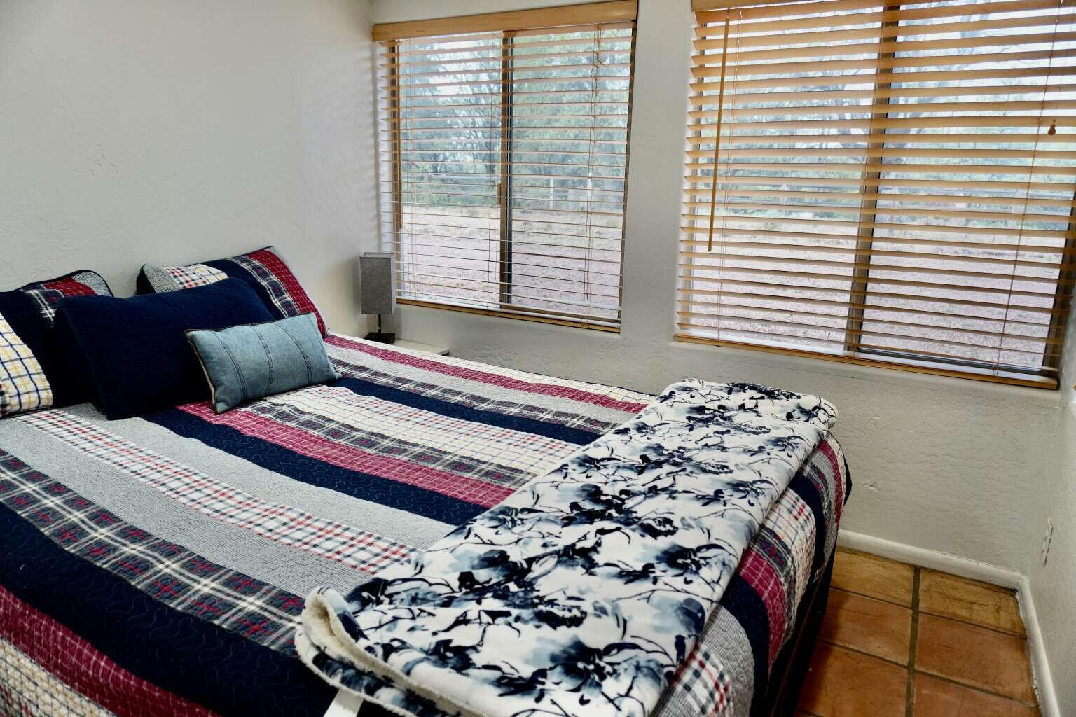 167 South Ranch Lane Payson, AZ 85541 - Photo 31 of 40 a bedroom with a bed and a window