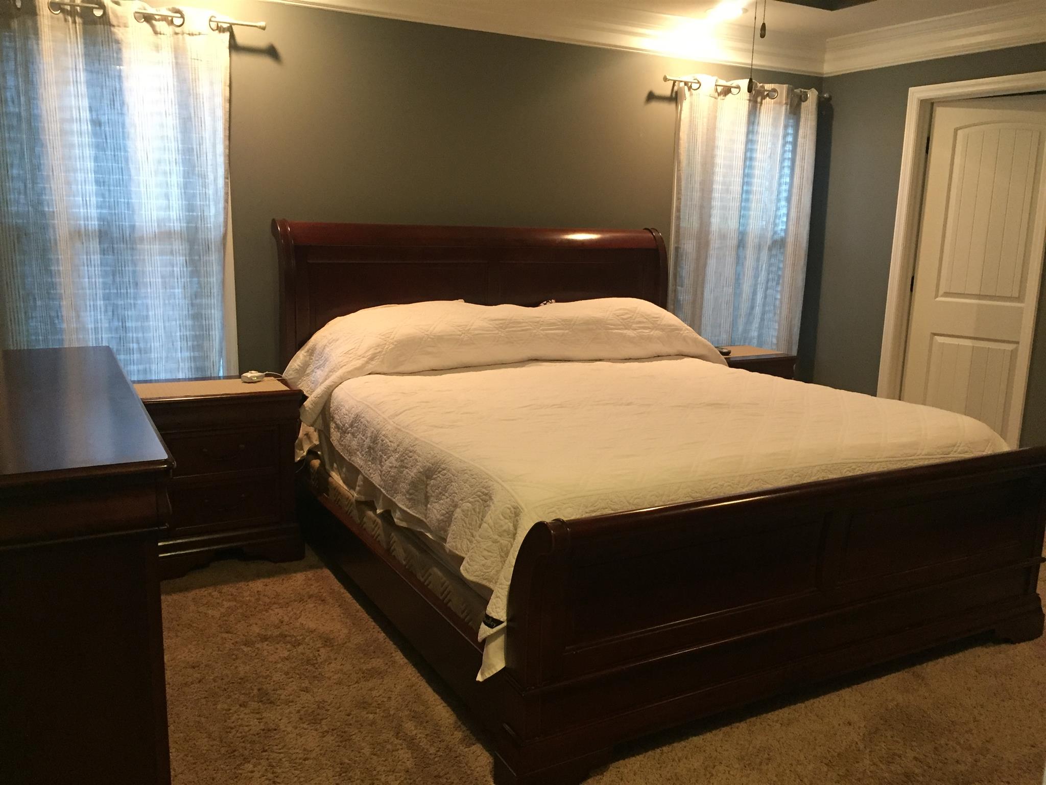 67 Remington Road Lebanon, TN 37090 - Photo 1 of 26 a bed sitting in a bedroom next to a window
