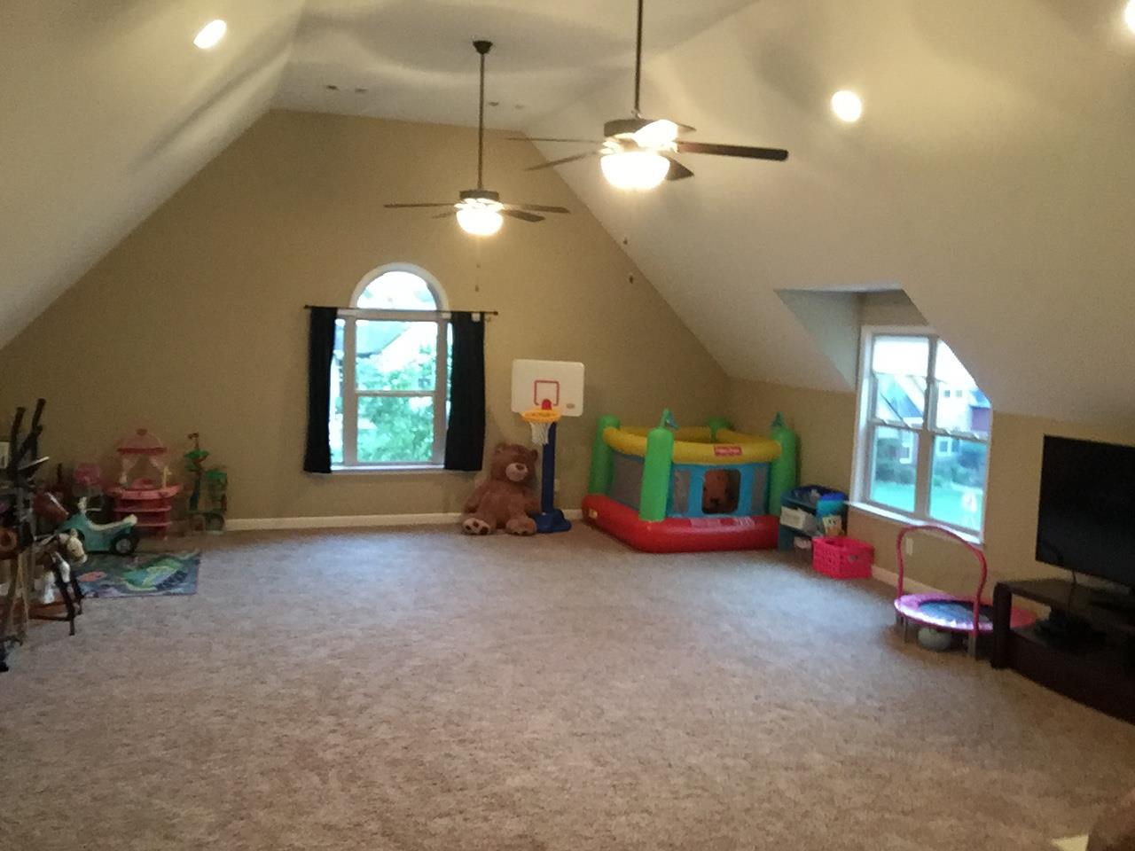 67 Remington Road Lebanon, TN 37090 - Photo 17 of 26 a view of a room with gym equipment and windows