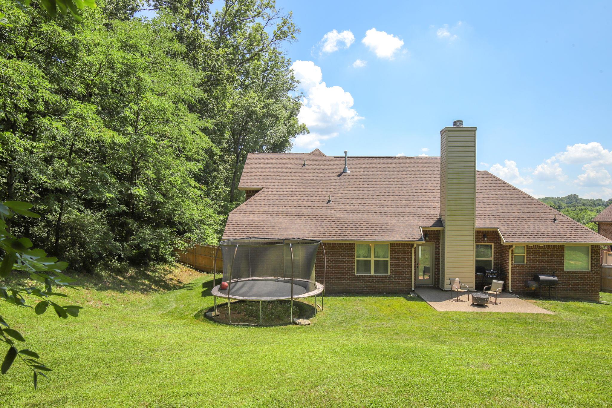 67 Remington Road Lebanon, TN 37090 - Photo 24 of 26 a front view of a house with garden