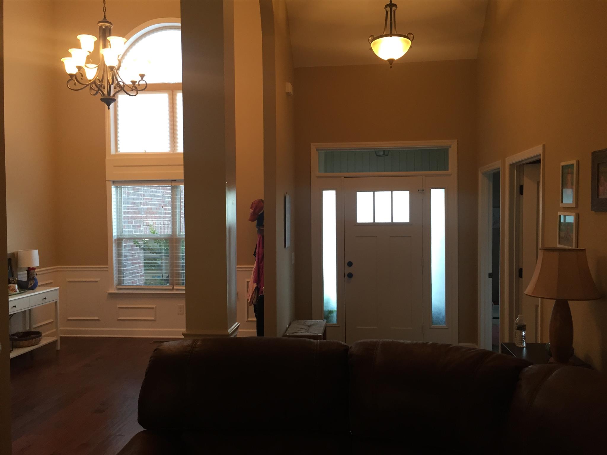 67 Remington Road Lebanon, TN 37090 - Photo 10 of 26 a bedroom with windows and a chandelier