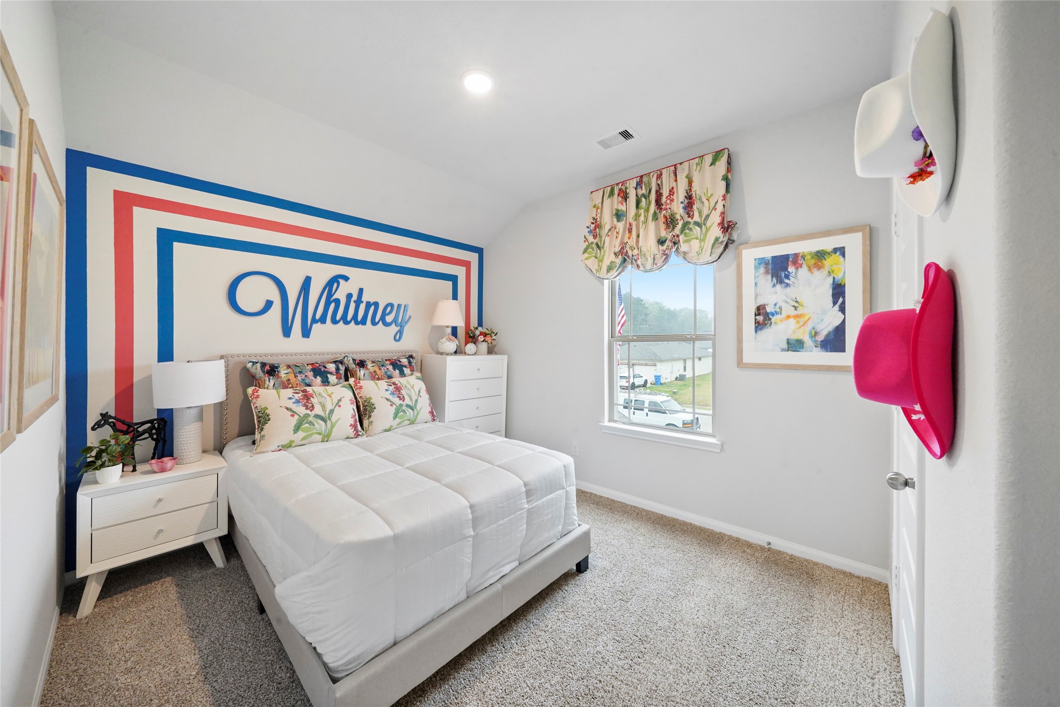 10912 Independence Road Cleveland, TX 77328 - Photo 22 of 25 a bedroom with a bed and a painting on the wall