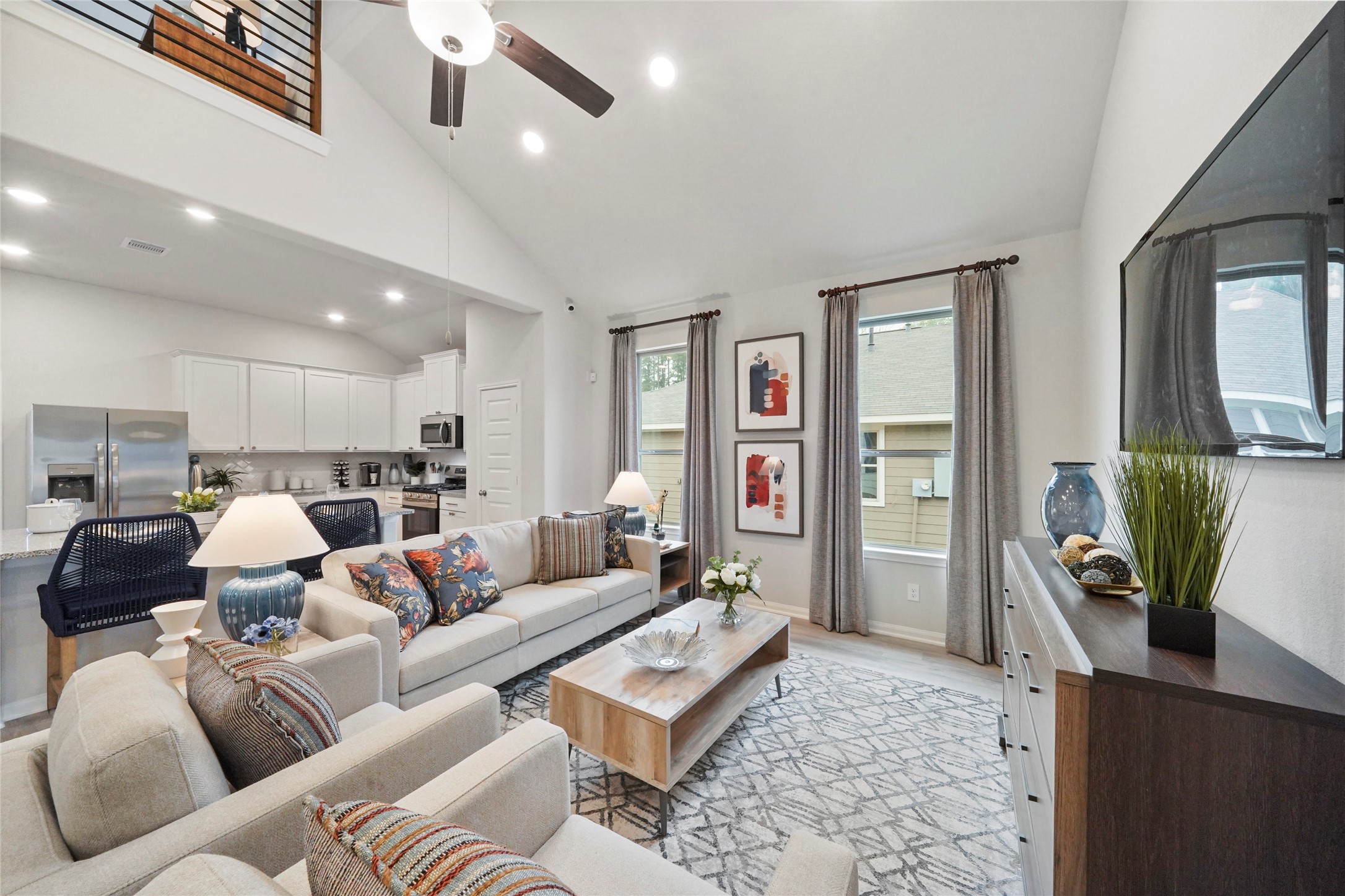 10912 Independence Road Cleveland, TX 77328 - Photo 4 of 25 a living room with furniture kitchen view and a window