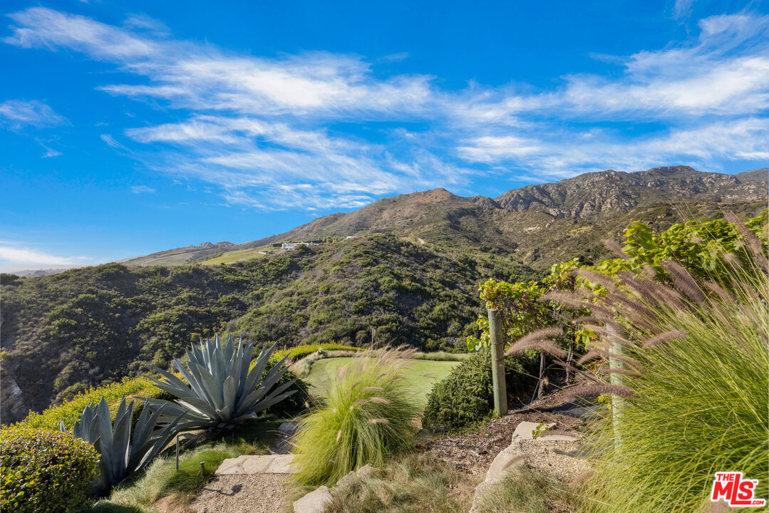 22407 Carbon Mesa Road Malibu, CA 90265 - Photo 25 of 33 a view of a lake with a mountain