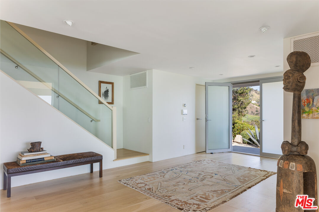 22407 Carbon Mesa Road Malibu, CA 90265 - Photo 4 of 33 a view of entryway and hall