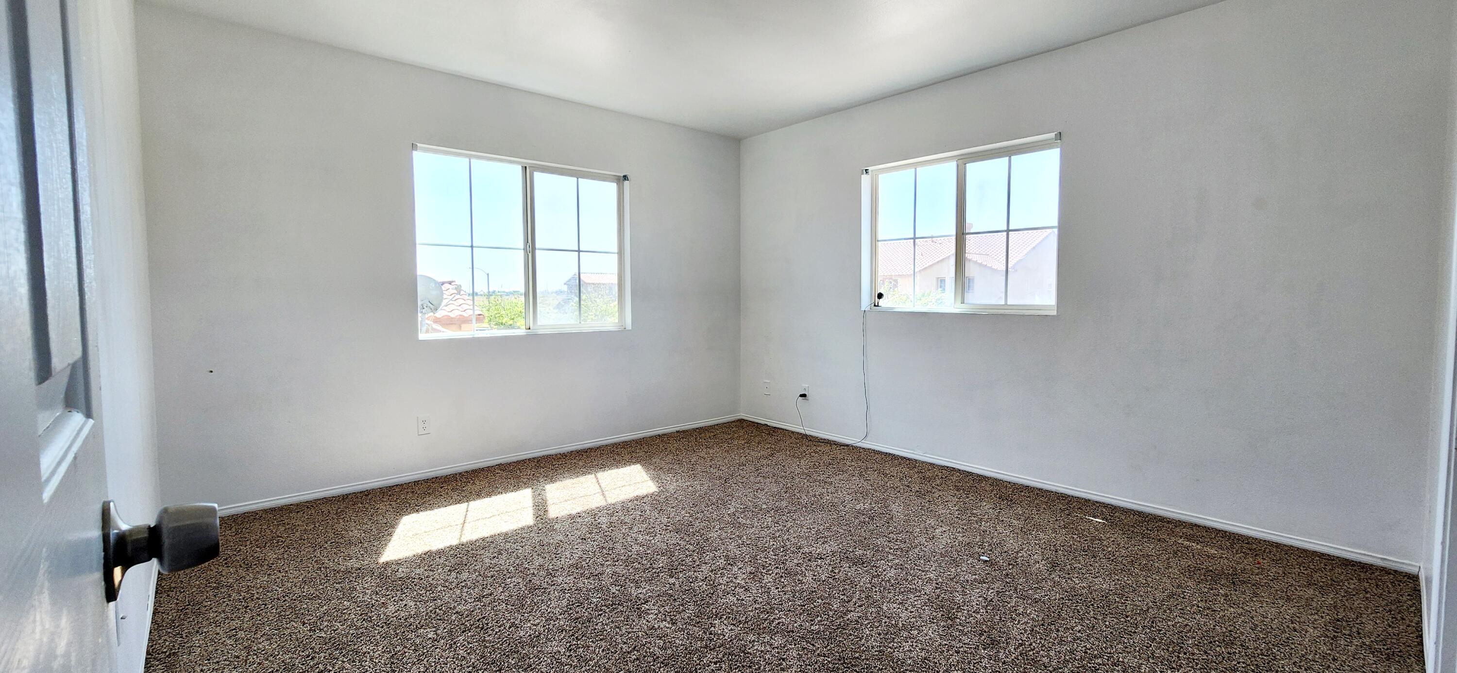 5817 Gem Court Lancaster, CA 93536 - Photo 15 of 26 an empty room with windows