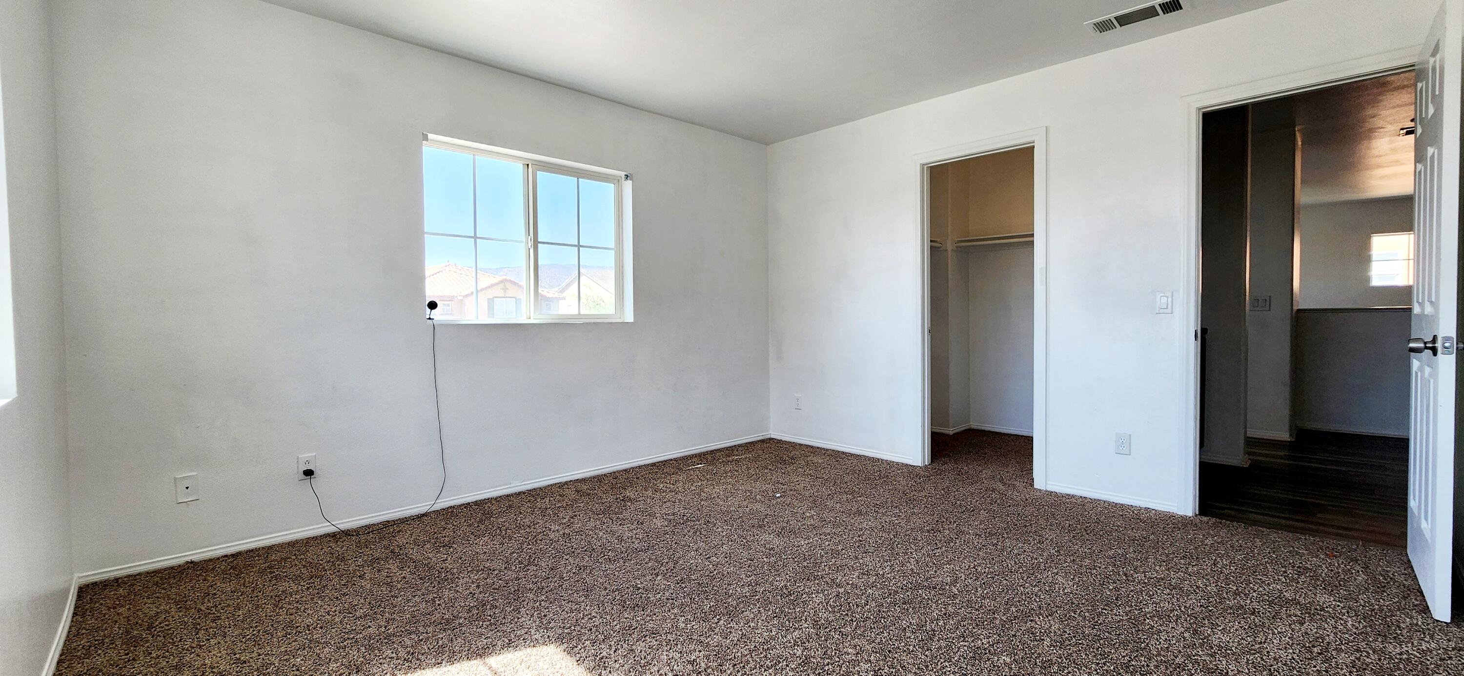 5817 Gem Court Lancaster, CA 93536 - Photo 16 of 26 an empty room with windows