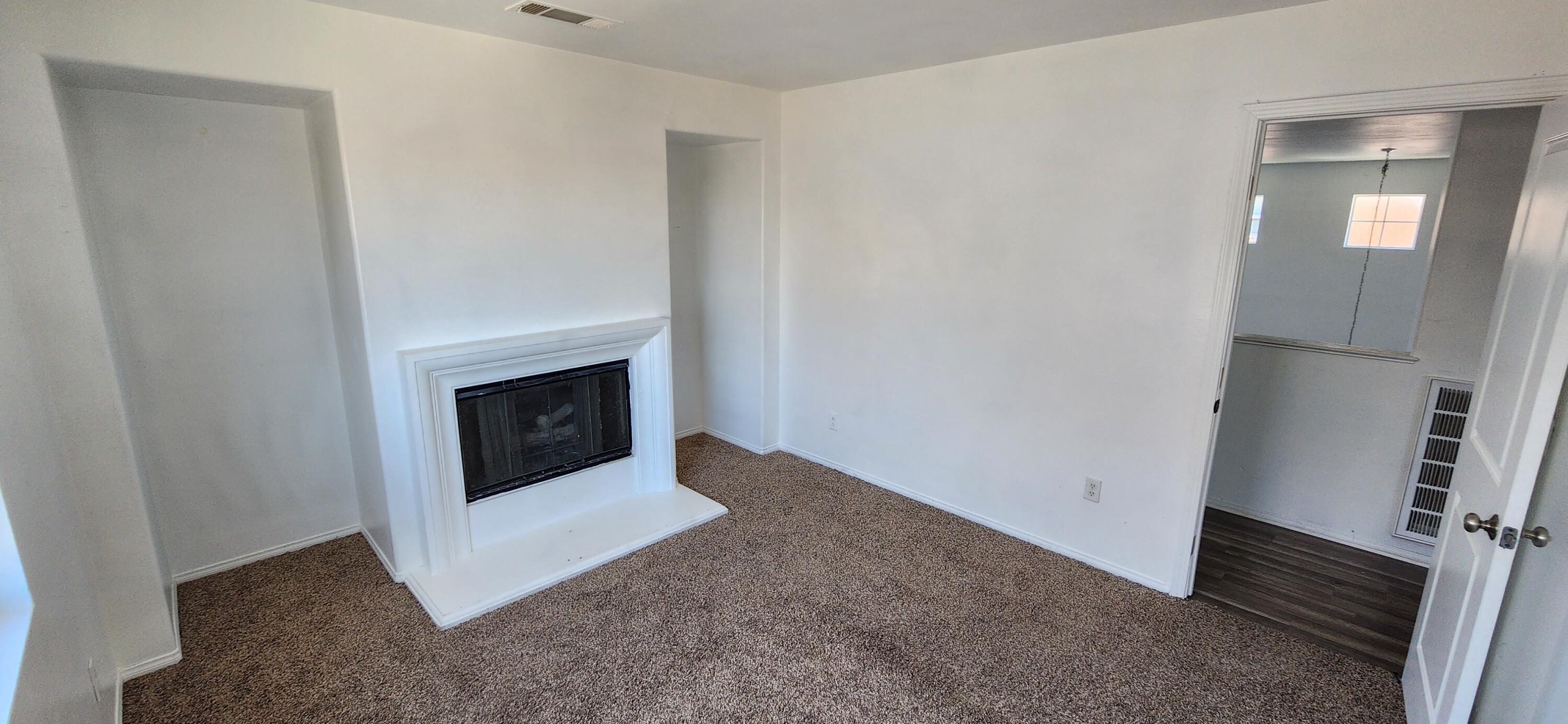 5817 Gem Court Lancaster, CA 93536 - Photo 18 of 26 a view of a livingroom with a fireplace