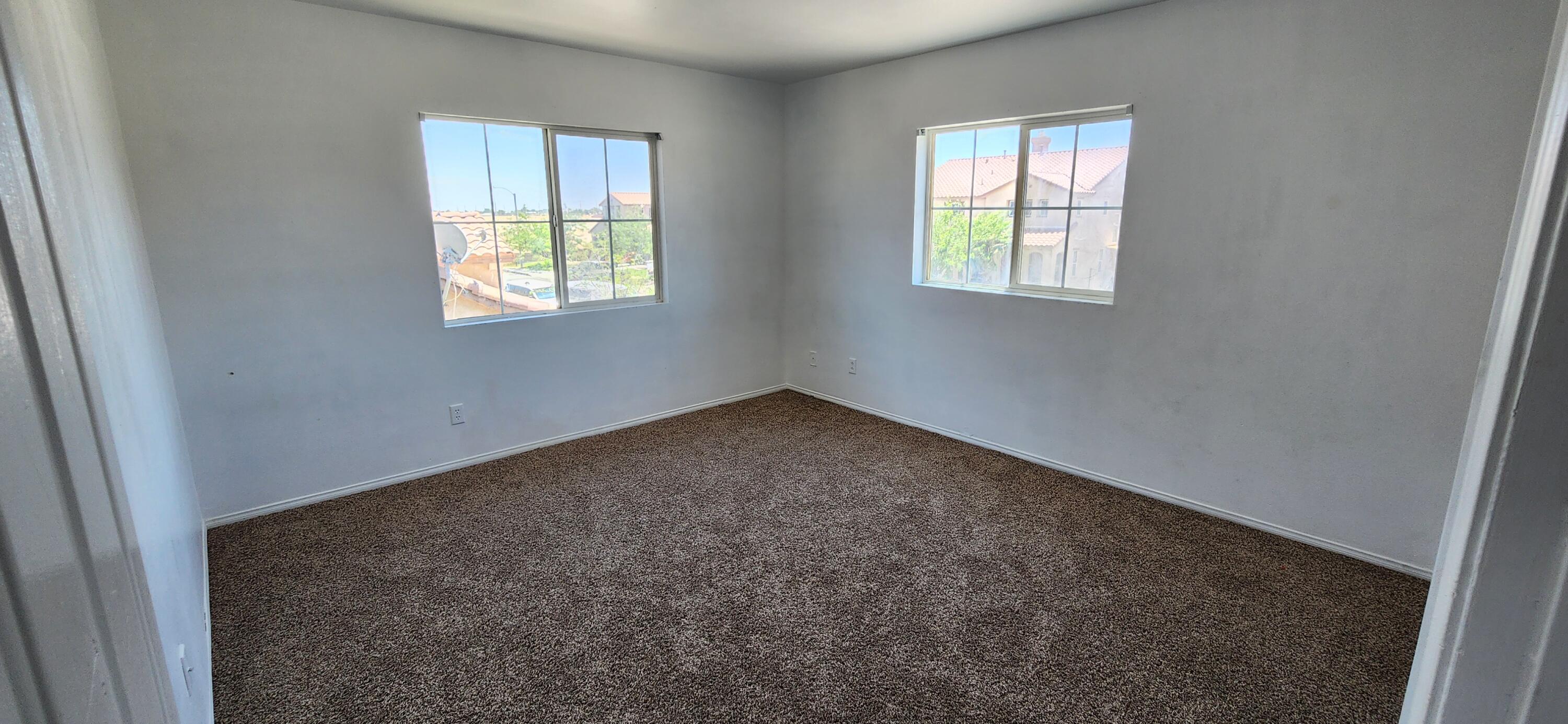 5817 Gem Court Lancaster, CA 93536 - Photo 20 of 26 an empty room with windows