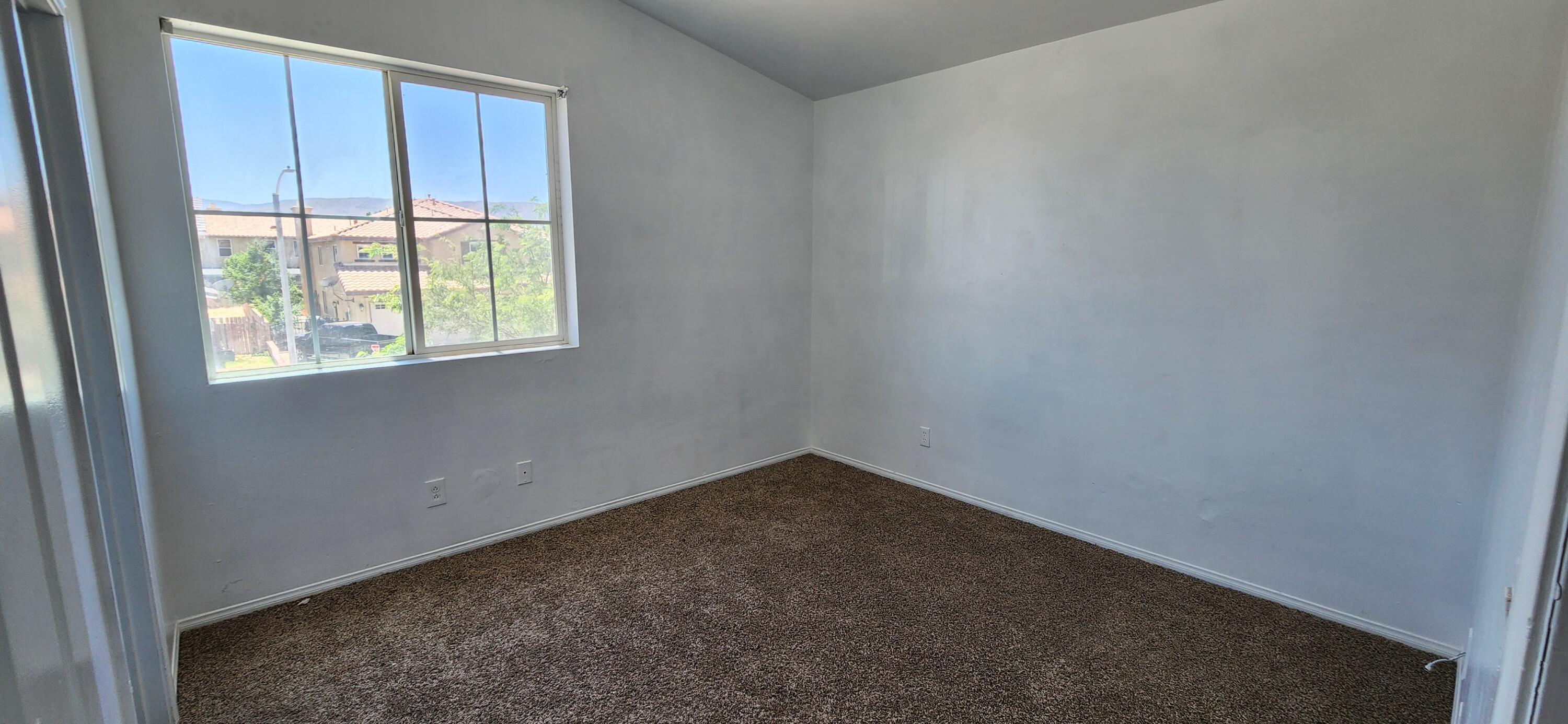 5817 Gem Court Lancaster, CA 93536 - Photo 21 of 26 an empty room with a window
