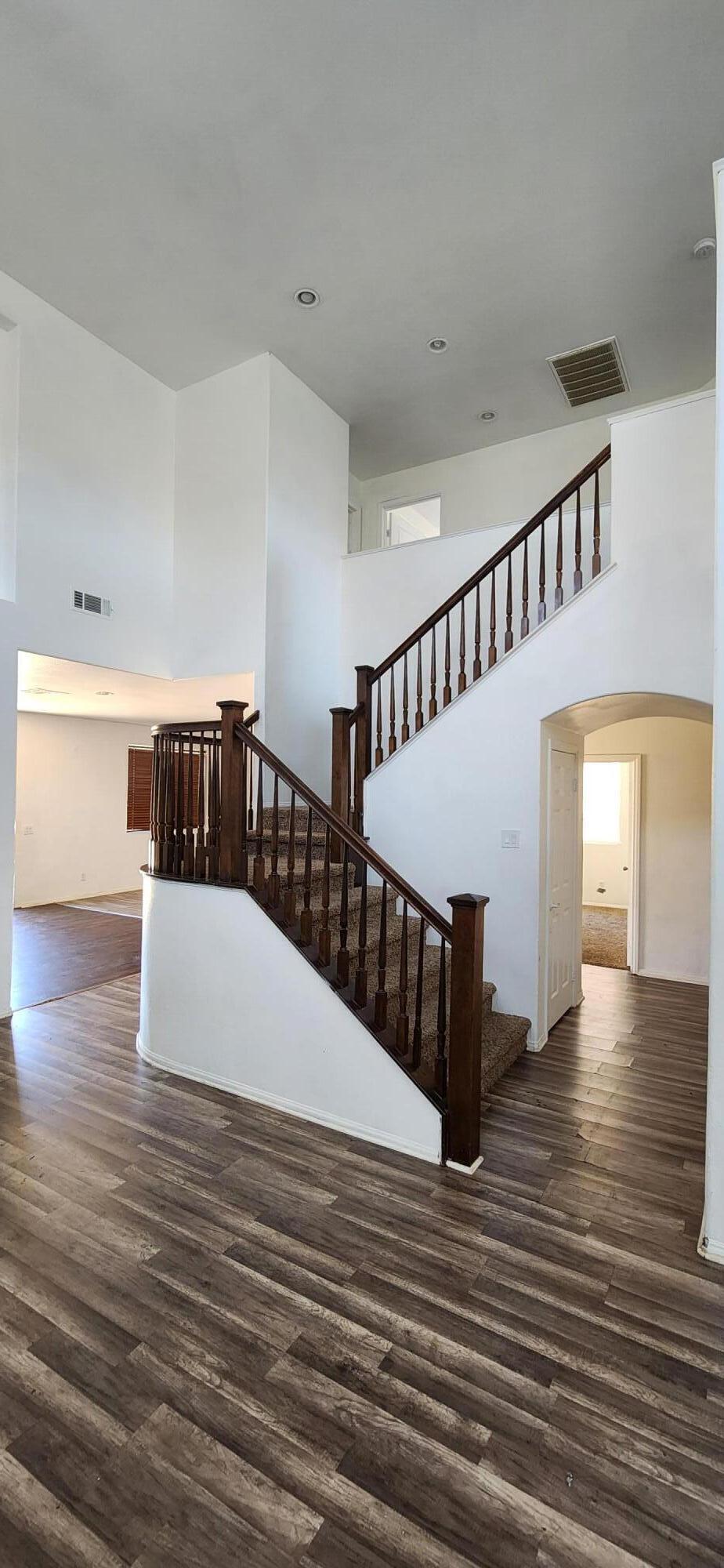 5817 Gem Court Lancaster, CA 93536 - Photo 5 of 26 a view of entryway and hall with wooden floor