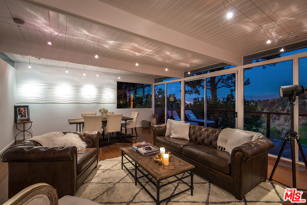 3356 Woodcliff Road Sherman Oaks, CA 91403 - Photo 3 of 15 a living room with furniture
