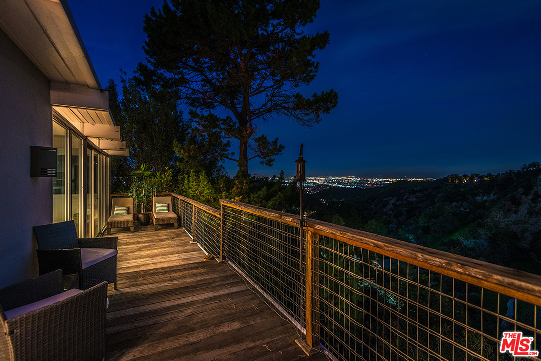 3356 Woodcliff Road Sherman Oaks, CA 91403 - Photo 9 of 15 a balcony with view of outdoor space