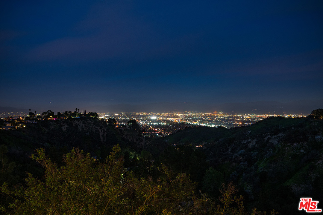 3356 Woodcliff Road Sherman Oaks, CA 91403 - Photo 10 of 15 a view of city and a lake